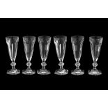 A SET OF SIX BACCARAT CRYSTAL CHAMPAGNE FLUTES