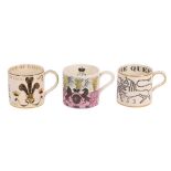 A GROUP OF WEDGWOOD COMMEMORATIVE MUGS