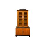 A BIEDERMEIER-STYLE EBONY AND WALNUT BOOKCASE