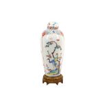 A JAPANESE KAKIEMON-STYLE VASE AND COVER