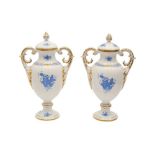 A PAIR OF HEREND BLUE APPONYI PATTERN PORCELAIN VASES AND COVERS