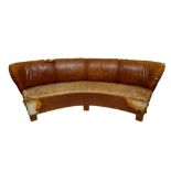 A VICTORIAN CURVED SOFA