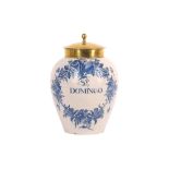 A DUTCH DELFTWARE TOBACCO JAR BY DRIE KLOKKEN