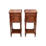 A PAIR OF FRENCH MARBLE TOP BEDSIDE TABLES