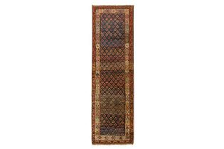 AN ANTIQUE NORTH-WEST PERSIAN RUNNER