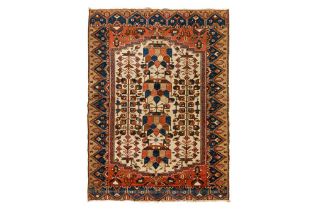 AN UNUSUAL NORTH-WEST PERSIAN RUG