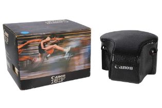 A Boxed Canon EF SLR Camera.