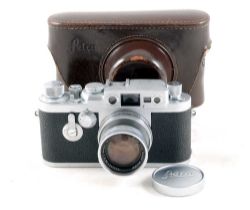 Chrome Leica IIIg with 5cm f2 Summicron Lens.