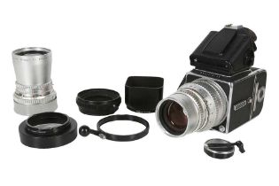 A Hasselblad 500C/M chrome with lenses and accessories.