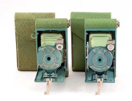 Two Teal & Blue Folding Kodak Cameras.