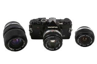 A Black Olympus OM1 MD Outfit.