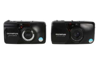 A pair of Olympus MJU ZOOM and ZOOM 105 cameras.