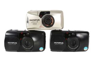 Three Olympus MJU ZOOM cameras.