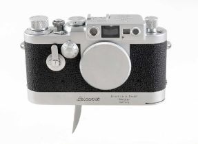 A Leica IIIG Body with Leicavit Trigger Winder & Case.