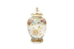 A CHINESE FAMILLE-ROSE 'BLOSSOMS' TEA CADDY AND COVER 清乾隆 粉彩花卉紋茶葉罐