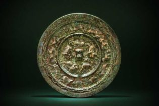 A CHINESE SILVERED BRONZE 'ZODIAC' MIRROR 西晉 生肖紋鍍銀銅鏡