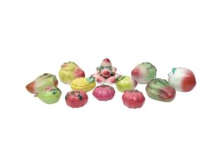 TWELVE CHINESE EXPORT PORCELAIN MODELS OF FRUIT 清 十九或二十世紀 外銷仿生瓷各式水果擺件