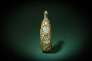 A CHINESE GOLD- AND SILVER-INLAID BRONZE 'PHOENIX' GARMENT HOOK, DAIGOU 戰國 銅錯金銀鳳紋帶鉤