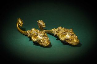 A PAIR OF LARGE CHINESE GILT-BRONZE GARMENT HOOKS, DAIGOU 戰國 銅鎏金龍紋帶鉤一對