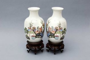 A CHINESE PAIR OF FAMILLE-ROSE EGGSHELL PORCELAIN OVOID VASES AND STANDS 民國時期 粉彩繪高士童子圖蛋殼瓷瓶連坐一對 《洪憲年製