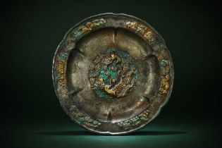 A CHINESE PARCEL-GILT AND SILVERED IRON 'PHOENIX' DISH 唐 局部鎏金及銅鎏銀雙鳳紋盤
