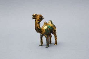 A CHINESE GILT-BRONZE MODEL OF A BACTRIAN CAMEL 漢 銅鎏金駱駝