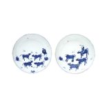 A PAIR OF CHINESE BLUE AND WHITE KO-SOMETSUKE 'OXHERD' DISHES 明 古染付青花牧童圖紋盤一對