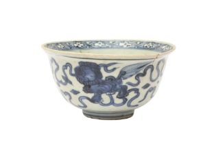 A CHINESE BLUE AND WHITE 'LION DOG' BOWL 明 青花佛獅紋盌