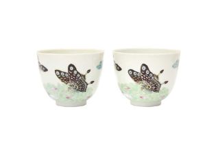 A PAIR OF CHINESE FAMILLE-ROSE 'BUTTERFLY' CUPS 清道光 粉彩花蝶圖紋盃一對 《大清道光年製》款