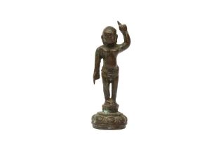 A CHINESE BRONZE FIGURE OF THE INFANT BUDDHA 明 銅浴佛太子像