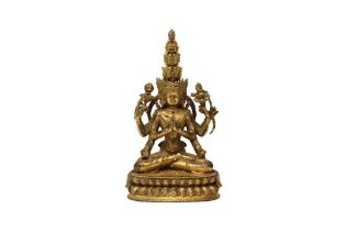 A SINO-TIBETAN GILT-BRONZE FIGURE OF AVALOKITESHVARA 清十九世紀 銅鎏金聖觀音坐像