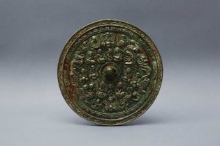 A CHINESE BRONZE 'IMMORTALS' MIRROR 東漢 銅仙人紋鏡