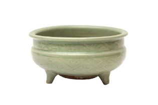 A CHINESE LONGQUAN CELADON INCENSE BURNER 明 龍泉青釉錦紋三足爐