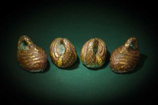 A RARE SET OF FOUR CHINESE GOLD- AND SILVER- INLAID BRONZE 'GOOSE' MAT WEIGHTS 漢 銅錯金銀鵝形席鎮