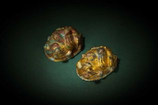 A PAIR OF CHINESE GILT-BRONZE 'CAMEL' MAT WEIGHTS 銅鎏金駱駝形席鎮一對