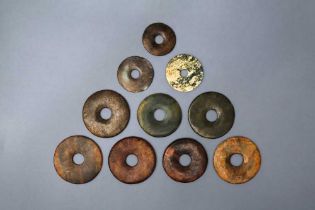 A SET OF TEN ARCHAIC JADE 'BI' DISCS 新石器時代 玉璧一組十件