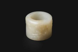 A CHINESE WHITE JADE ARCHER'S RING 清 白玉扳指