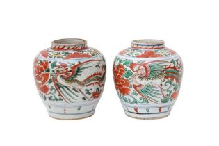 TWO CHINESE WUCAI 'PHOENIX' JARS 明十七世紀 五彩穿花鳳紋罐一對