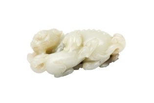 A CHINESE PALE-CELADON JADE 'LION DOGS' CARVING 清十九世紀 青白玉雕大獅少獅