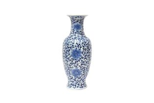 A CHINESE BLUE AND WHITE 'BLOSSOMS' VASE 清十九世紀 青花纏枝花卉紋瓶 《大清雍正年製》款