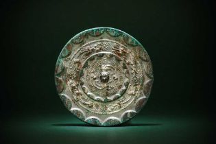 A CHINESE SILVERY BRONZE 'CHILONG' MIRROR 唐 螭龍紋鍍銀銅鏡