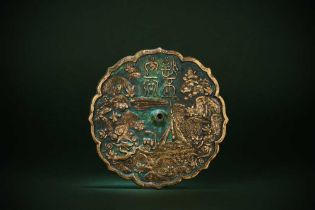 A CHINESE BRONZE 'DRAGON SLAYER' MIRROR 宋 銅屠龍紋鏡