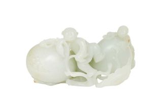 A CHINESE PALE-CELADON JADE 'BOYS AND POMEGRANATES' WATER DROPPER 清十八世紀 青白玉「福壽多子」圖水滴