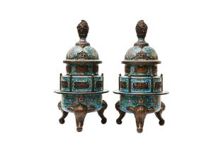 A PAIR OF LARGE CHINESE CLOISONNÉ TRIPOD CENSERS AND COVERS 清十九世紀 掐絲琺瑯纏枝蓮紋三足爐 《乾隆年製》款