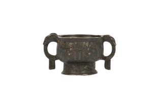 A SMALL CHINESE BRONZE ARCHAISTIC CENSER, GUI 銅雙耳簋式爐