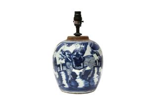 A CHINESE BLUE AND WHITE FIGURATIVE JAR 清十八世紀 青花嬰戲圖紋罐