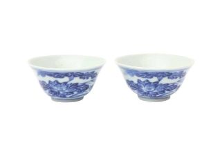 TWO CHINESE BLUE AND WHITE 'CRAB' CUPS 清 青花荷花蟹紋盃兩件 《成化年製》款
