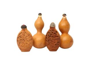 TWO CHINESE FRUIT PIT AND TWO GOURD SNUFF BOTTLES 晚清 雕果核鼻煙壺兩件及葫蘆鼻煙壺兩件