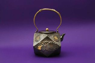 A JAPANESE INLAID 'FUKU' IRON TEA KETTLE AND COVER