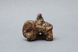 A CHINESE BRONZE 'ELEPHANT RIDER' PAPERWEIGHT 十九至二十世紀 銅胡人騎象紙鎮